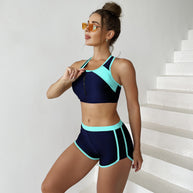 Damen Sportliche Bikinioberteil mit Reißverschluss und Shorts WW