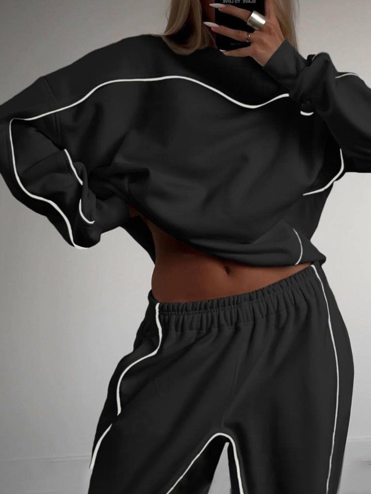 Damen sportliches und modisches Set mit cropped Oberteil und lässiger Hose WW