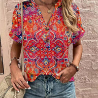 Damen Kurzarm Bluse mit dekorativem Musterdruck und knöpfbarem Ausschnitt WW