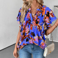 Damen Bluse mit eleganten Rüschendetails und verspieltem Print WW