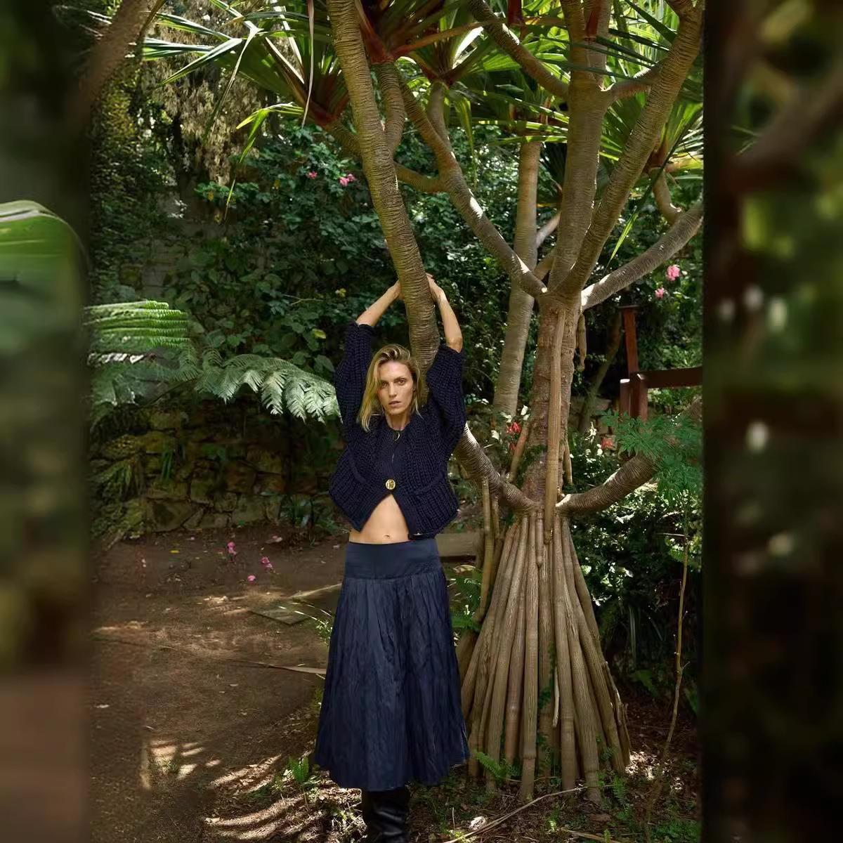 Damen Strickjacke mit dekorativen Knöpfen und seitlichen Taschen WW