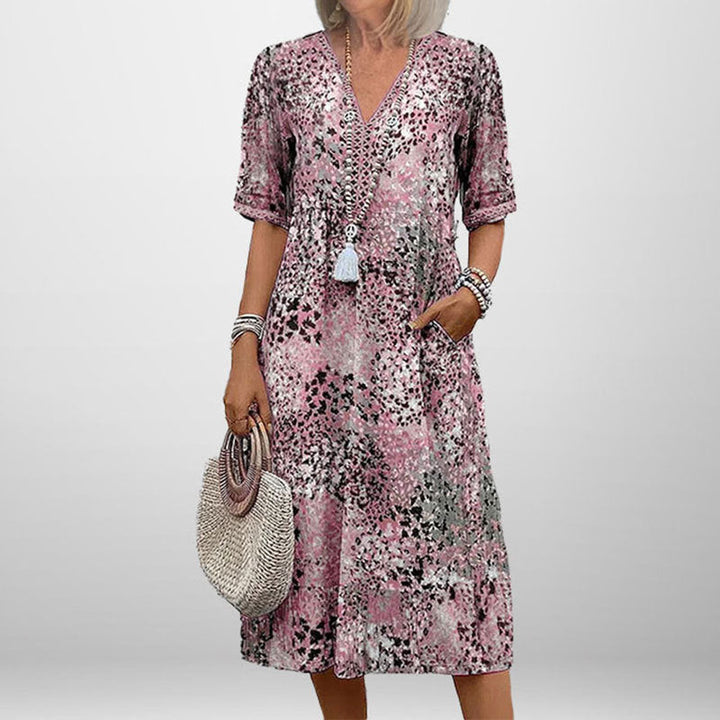 Damen Tunika-Kleid mit auffälligem Muster und modernem V-Ausschnitt W&W Mode