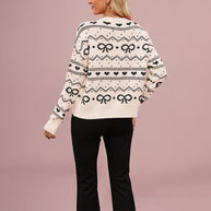 Damen Strickjacke mit verspieltem Herz- und Schleifenmuster WW