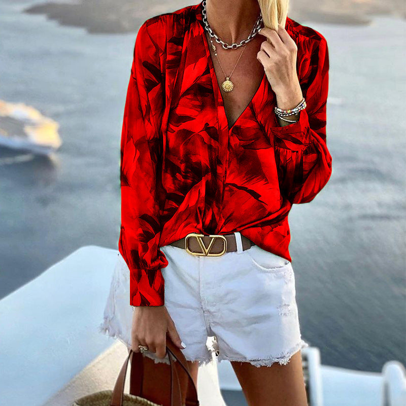 Damen Bluse mit floralem Muster und tiefem V-Ausschnitt WW