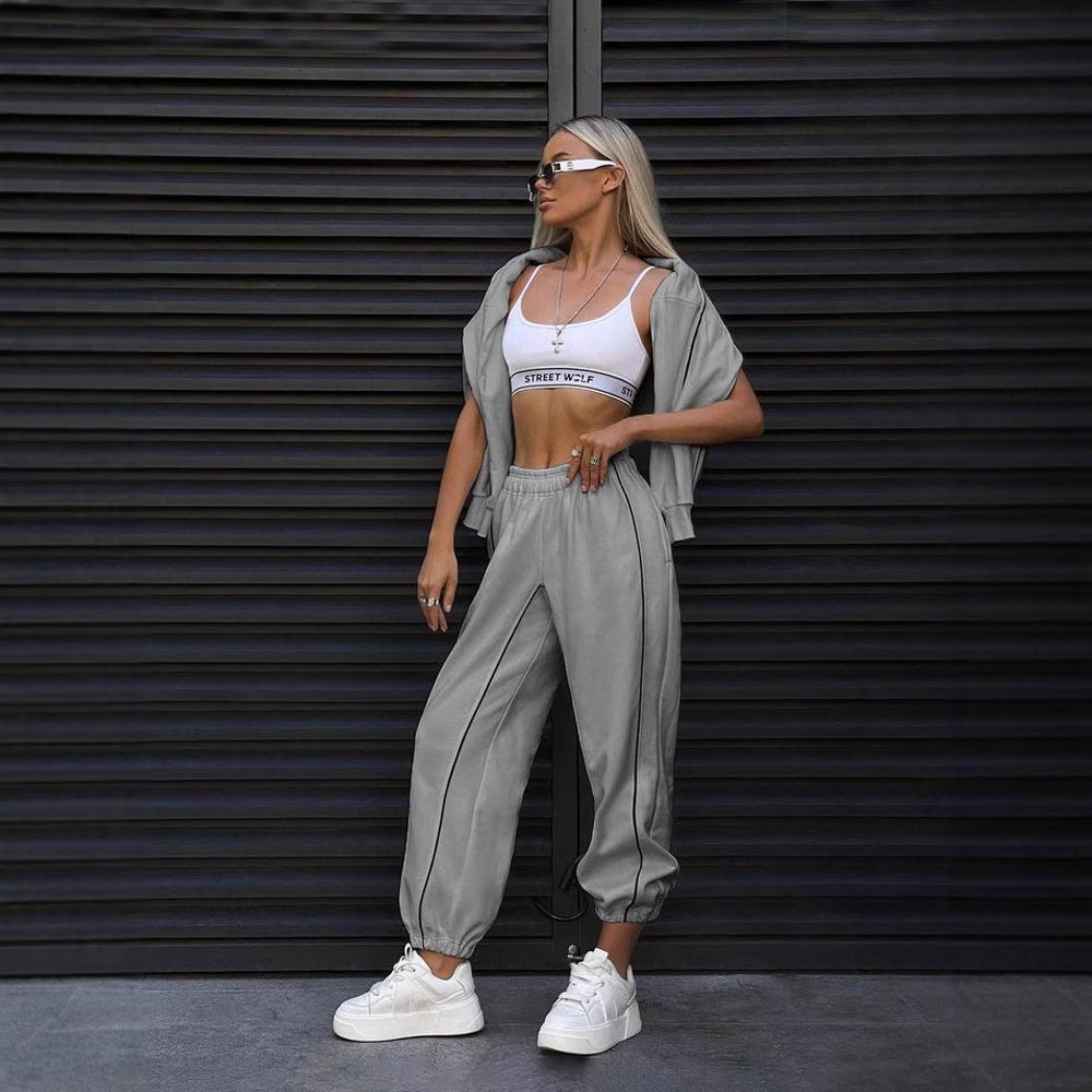 Damen sportliches und modisches Set mit cropped Oberteil und lässiger Hose WW