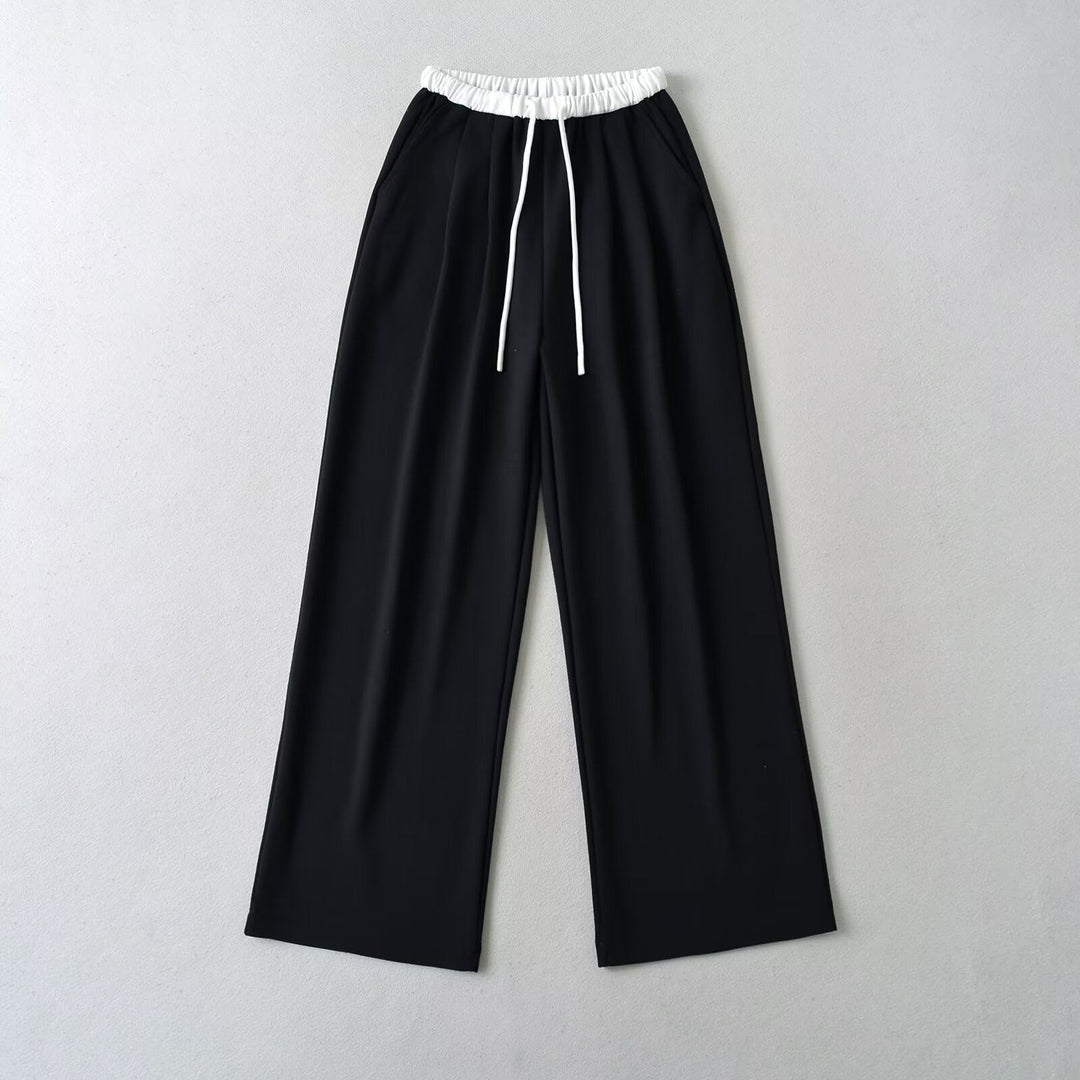 Damen gemütliche Sweatpants mit elastischem Bund und seitlichen Taschen W&W Mode