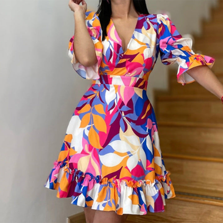 Damen Sommerkleid mit voluminösen Puffärmeln und fröhlichem Rüschen-Saum W&W Mode