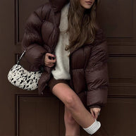 Damen Steppjacke im oversized Schnitt mit hohem Kragen und Taschen WW