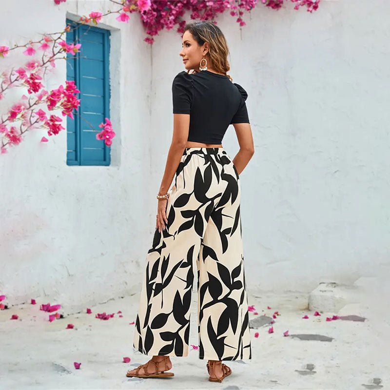 Damen Elegante weite Hose mit floralem Muster W&W Mode