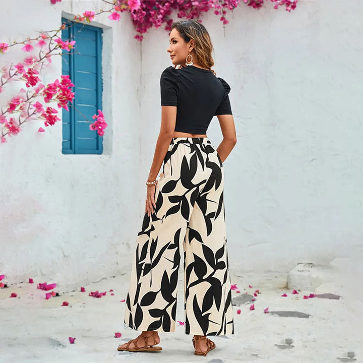 Damen Elegante weite Hose mit floralem Muster W&W Mode