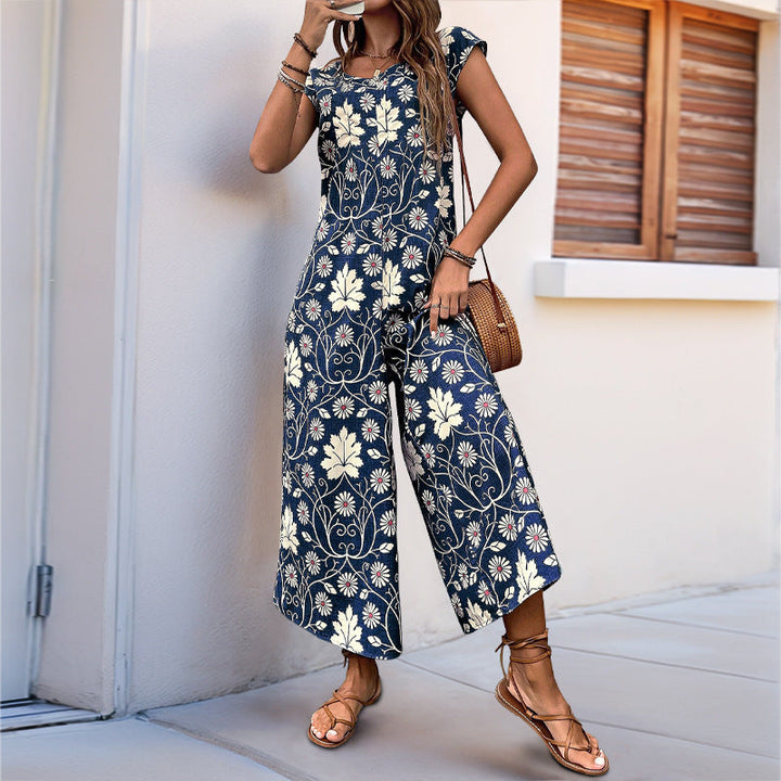 Damen Jumpsuit mit floralem Muster und praktischen Taschen W&W Mode