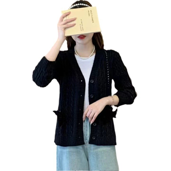 Damen Strickjacke mit dekorativen Taschen und Wellenmuster WW