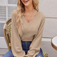 Damen Strickbluse mit feiner Rippstruktur und lässigem V-Ausschnitt WW