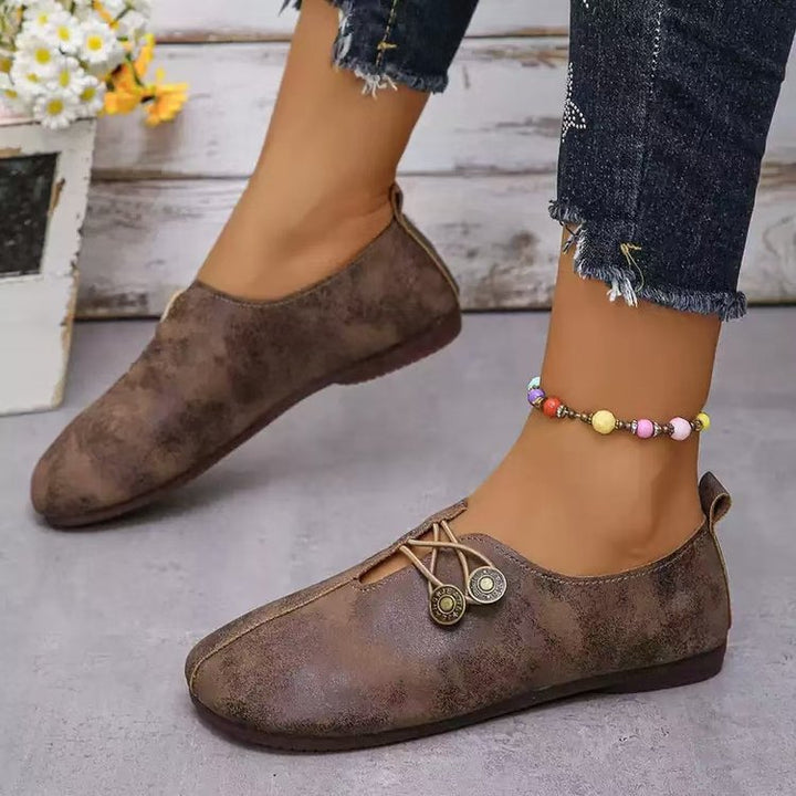 Damen Komfortable und stilvolle Slipper mit dekorativen Schnürdetails W&W Mode