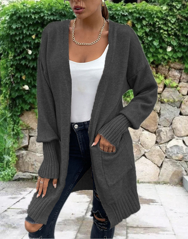 Damen Strickjacke mit geripptem Saum und praktischen Taschen WW