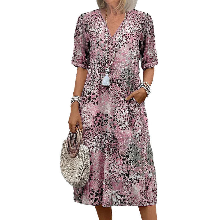 Damen Tunika-Kleid mit auffälligem Muster und modernem V-Ausschnitt W&W Mode