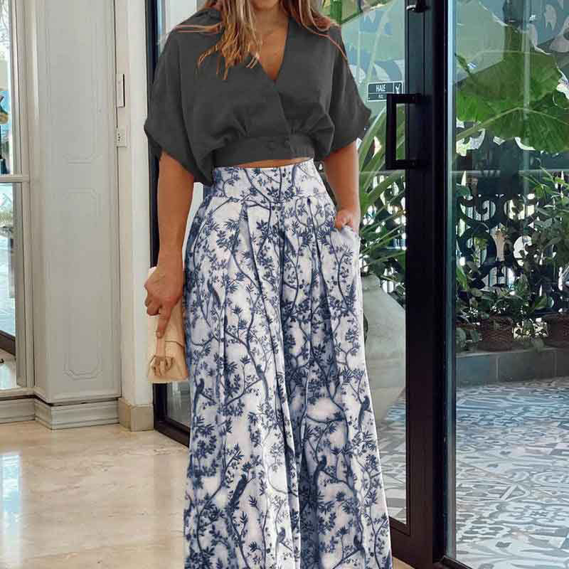 Damen Crop-Top Kombi-Anzug mit weitem Rock und floralem Muster W&W Mode
