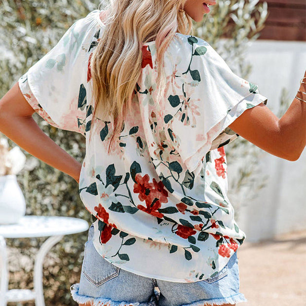 Damen luftige Bluse mit floralem Muster und dekorativen Knopfdetails WW