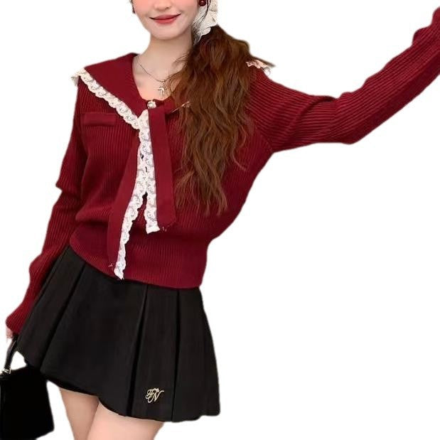 Damen Strickjacke mit Rüschen-Halsband und dekorativen Knöpfen WW