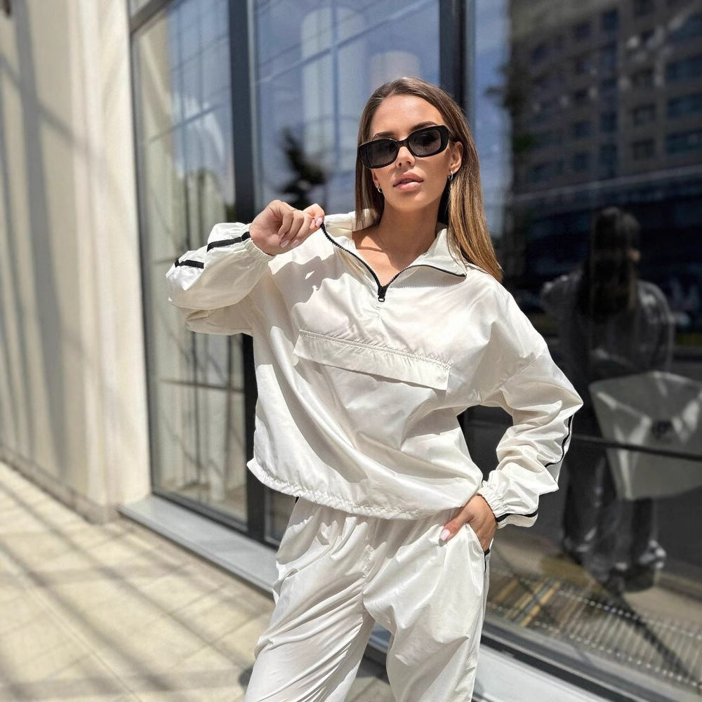 Damen sportlicher Funktionsanzug mit Stehkragen und elastischen Bündchen WW