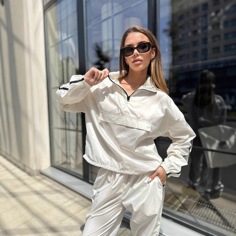 Damen sportlicher Funktionsanzug mit Stehkragen und elastischen Bündchen WW