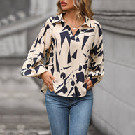 Damen Bluse mit auffälligem grafischem Design und voluminösen Ärmeln WW