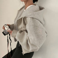 Damen Kapuzenpullover mit oversized Schnitt und praktischen Taschen WW