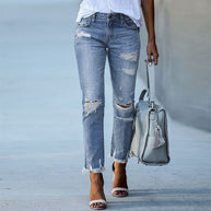 Damen Ripped High-Waist Jeans mit fransigem Saum und modischen Destroyed-Details WW