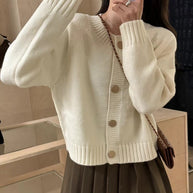 Damen Strickjacke mit Rundhalsausschnitt und dekorativen Knöpfen WW