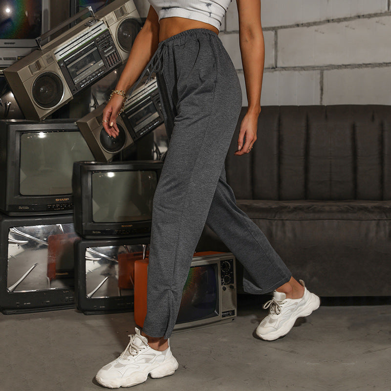 Damen Sportliche Jogginghose mit elastischem Bund und seitlichen Eingrifftaschen W&W Mode