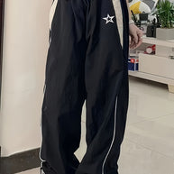 Damen Sportliche Weite Hose mit seitlichen Streifen und elastischem Bund WW