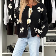 Damen Strickjacke mit dekorativen Schleifen und glänzenden Akzenten WW