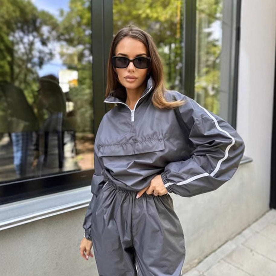 Damen sportlicher Funktionsanzug mit Stehkragen und elastischen Bündchen WW