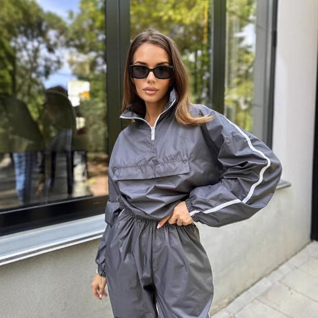 Damen sportlicher Funktionsanzug mit Stehkragen und elastischen Bündchen WW