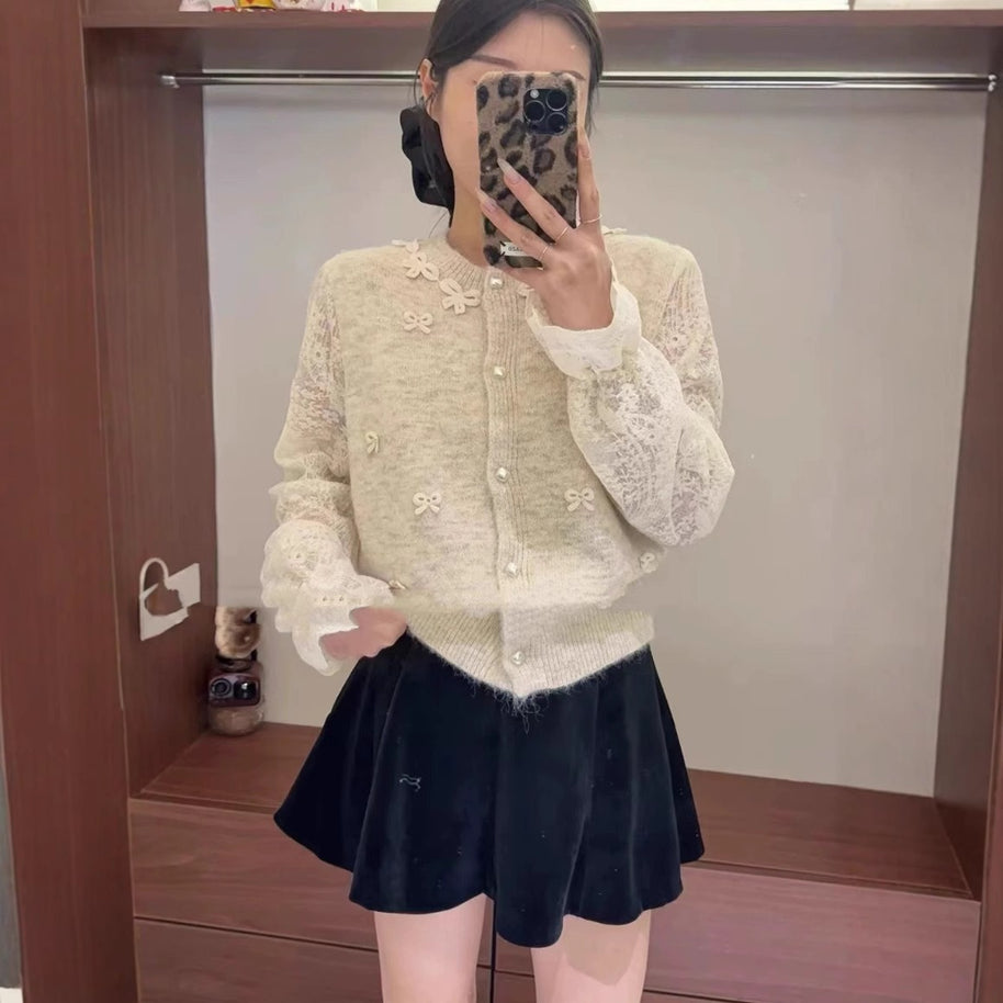 Damen Strickjacke mit eleganten Spitzen- und Schleifendetails WW