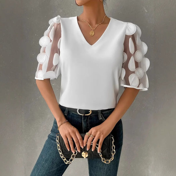 Damen Bluse mit transparenten Puffärmeln und eleganten Detail WW