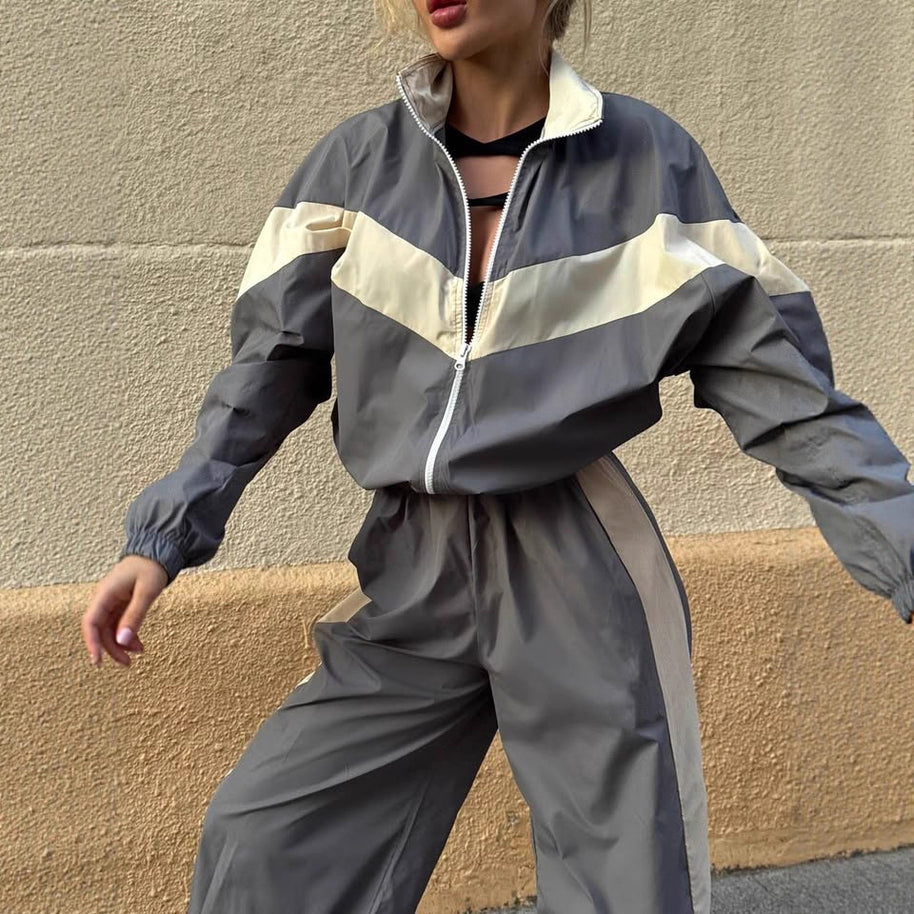 Damen sportlicher Funktionsanzug mit hohem Kragen und elastischen Bündchen WW