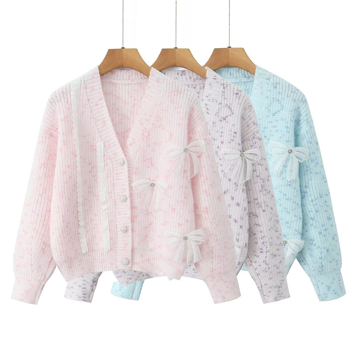 Damen Strickjacke mit dekorativen Schleifen und zartem Muster WW