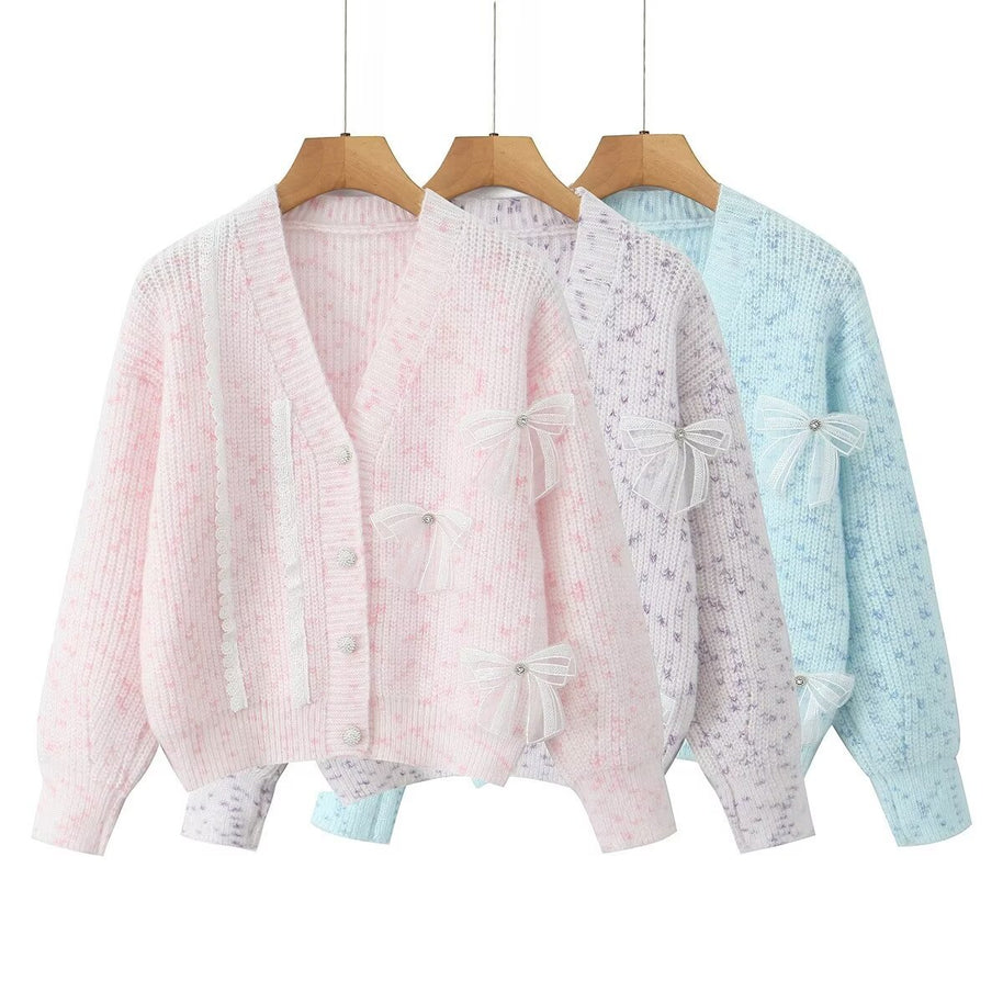 Damen Strickjacke mit dekorativen Schleifen und zartem Muster WW