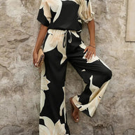 Damen entspanntes Jumpsuit mit floralem Design und elastischem Bund WW