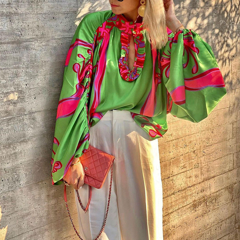 Damen Stylische Bluse mit voluminösen Ärmeln und farbenfrohem Muster W&W Mode