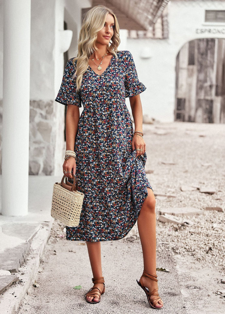 Damen Midi-Kleid mit floralem Muster und verspieltem V-Ausschnitt W&W Mode