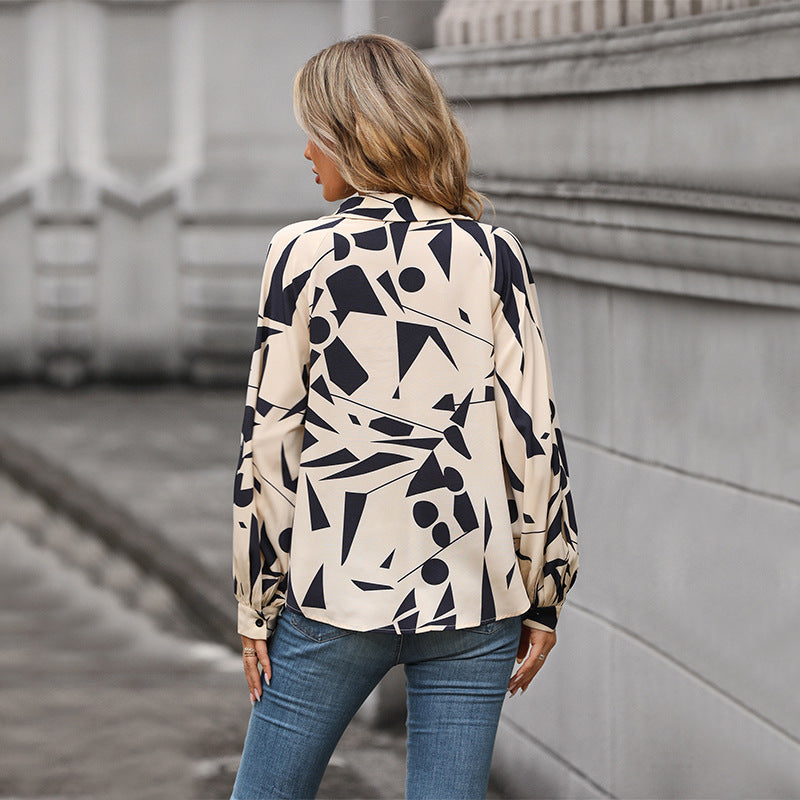 Damen Bluse mit auffälligem grafischem Design und voluminösen Ärmeln WW