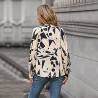 Damen Bluse mit auffälligem grafischem Design und voluminösen Ärmeln WW