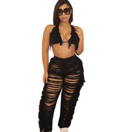 Damen Strandoutfit mit fransigem Crop-Top und lässiger Hose WW