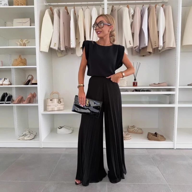 Damen Jumpsuit mit floralem Design und Schulterpolstern WW