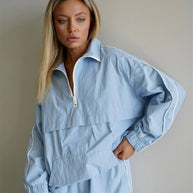 Damen sportliche Windjacke mit halbem Reißverschluss und elastischen Ärmeln WW