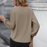Damen Bluse mit voluminösen Plisseeärmeln und elegantem V-Ausschnitt WW