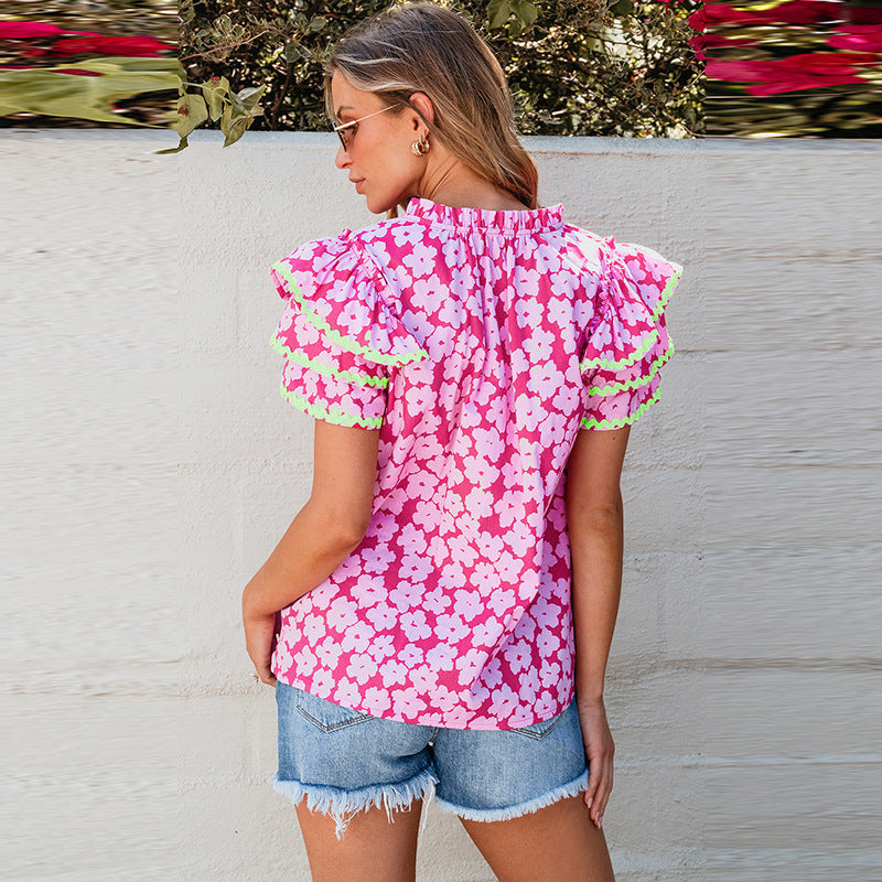 Damen Oberteil mit auffälligem Blumenmuster und Rüschen WW