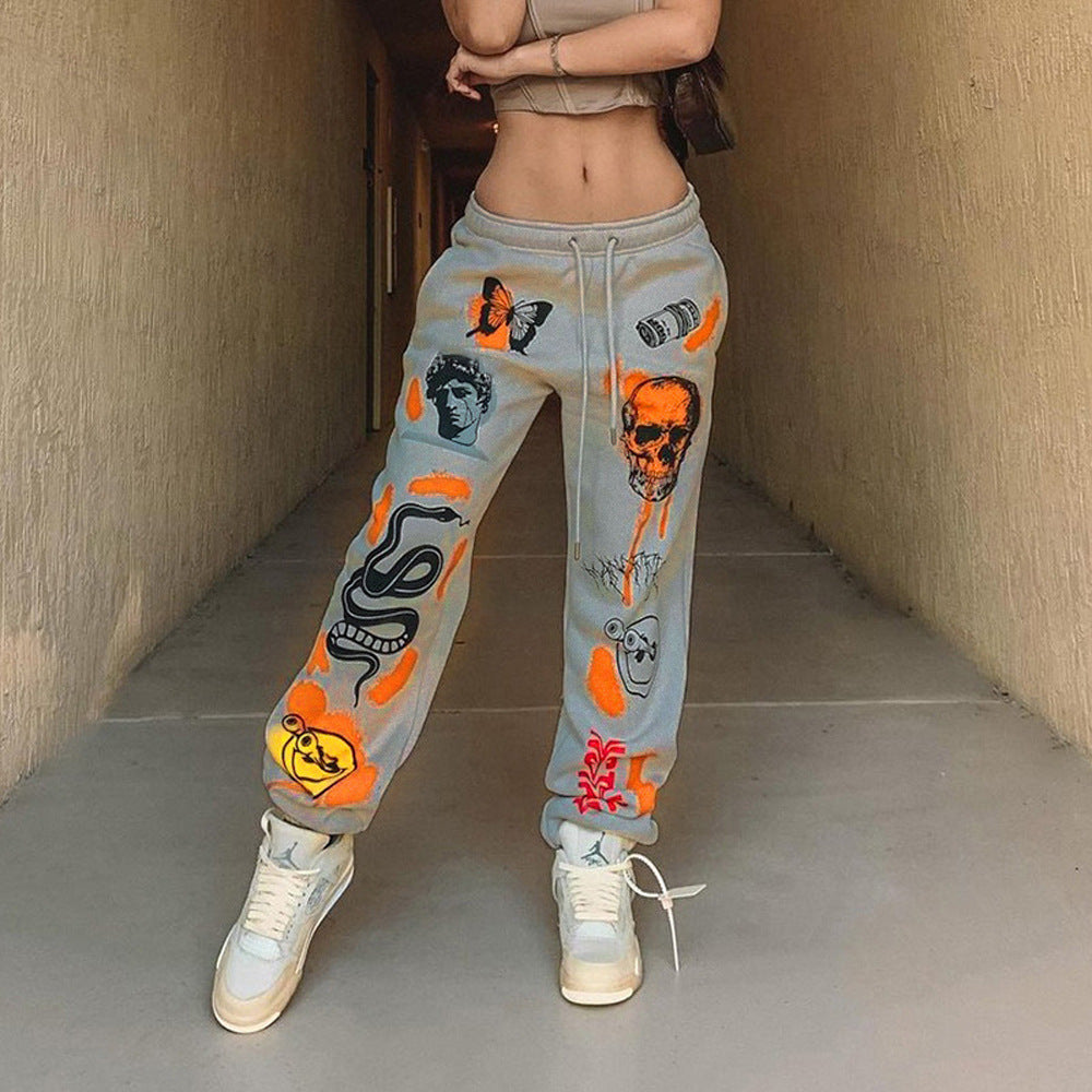 Damen Baggy Jogginghose mit kreativen Grafikdetails WW